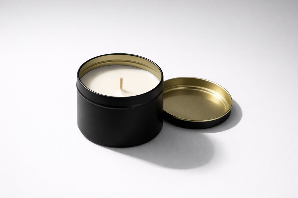 100ml candle in a black and gold tin.